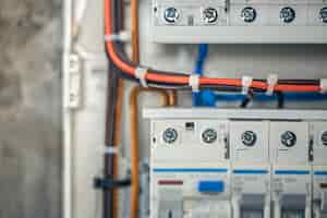 Free photo close up circuit breakers and wire in control panel