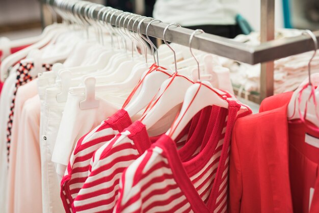 Close-up clothes on hangers in the store