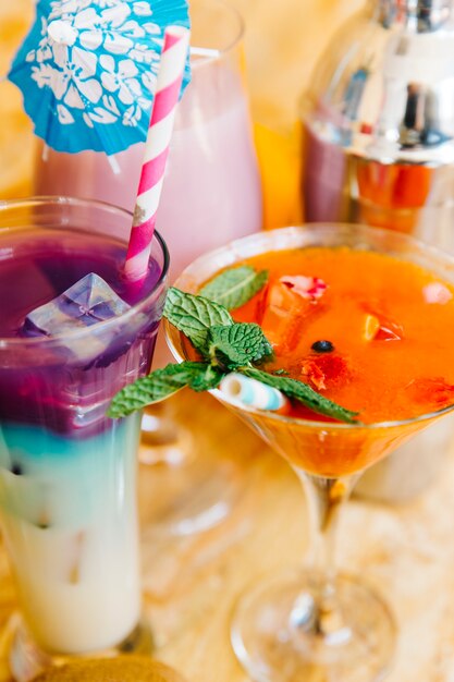 Close up of cocktails and tropical fruits