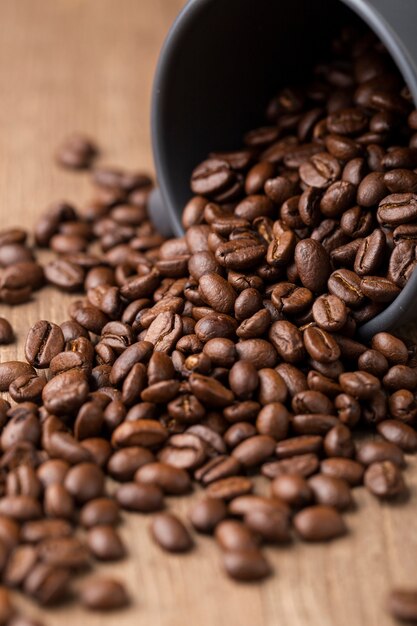Close-up coffee beans in mug