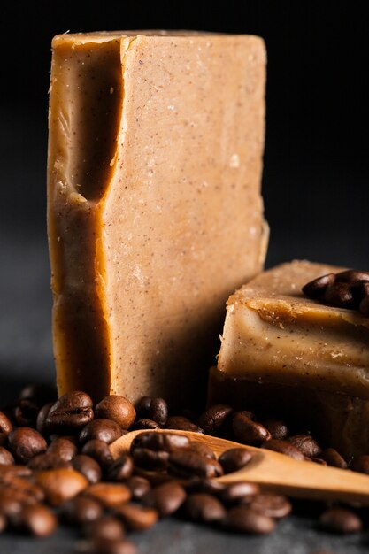 Close-up coffee beans soap beside coffee beans