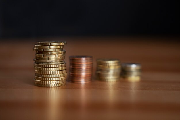 Close up on coins saved for energy crisis expenses