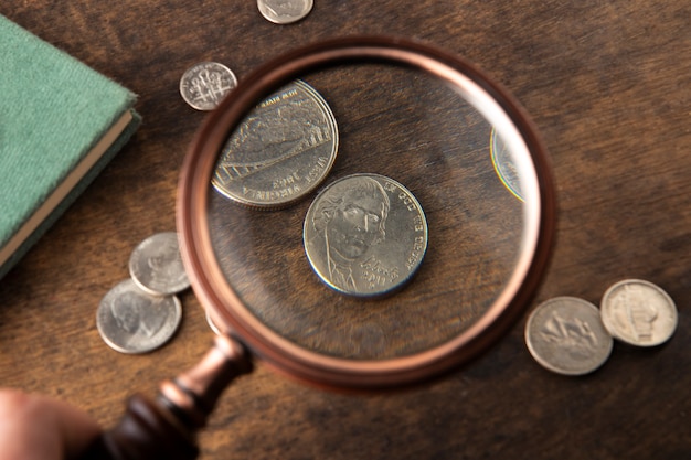 Close up on coins on table