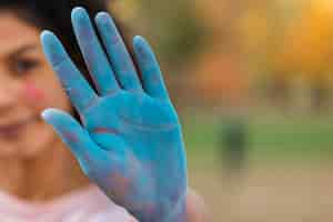 Free photo close-up of colored hand for holi