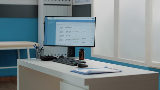 Close up of computer with medical files on monitor