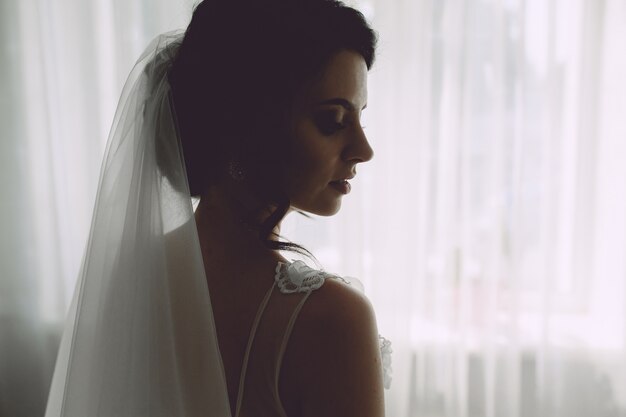 Close-up of concentrated bride