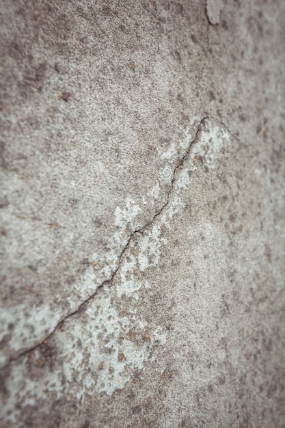 Free photo close-up of concrete wall with crack