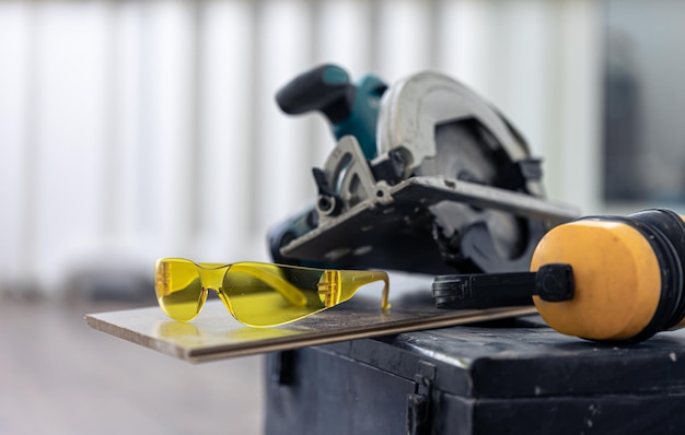 Free photo close up of construction safety goggles and work tools