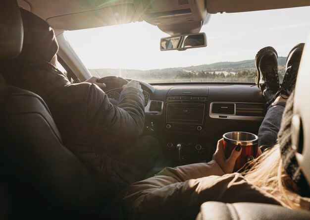 Close-up couple in car together