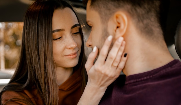 Close-up couple in car