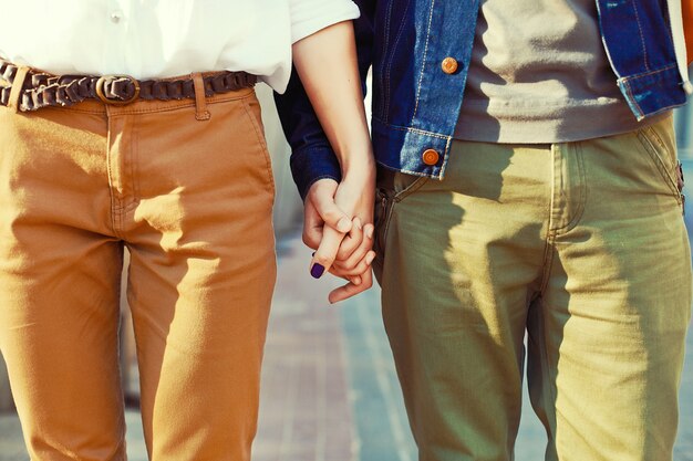 Close-up of couple holding hands