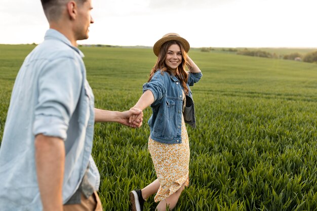 Close up couple holding hands