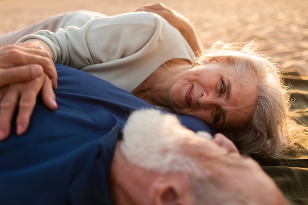 Close up couple laying together