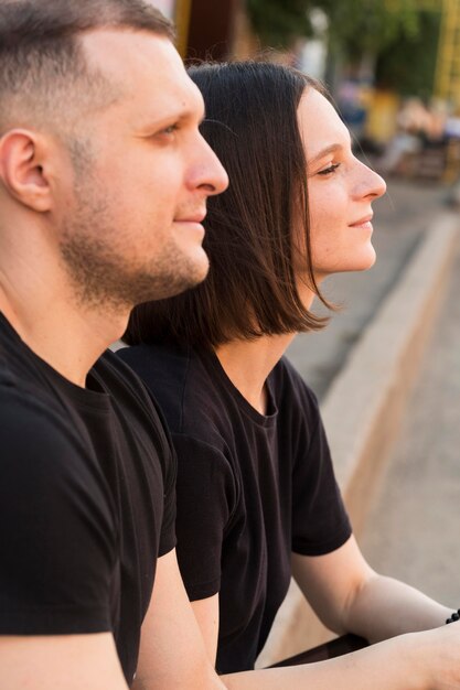 close-up couple looking away