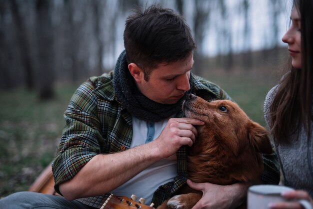 Close-up couple loving dog