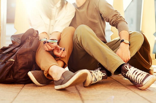 Free photo close-up of couple sitting on the porch