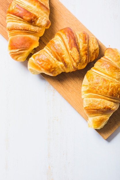 Close-up croissants on board