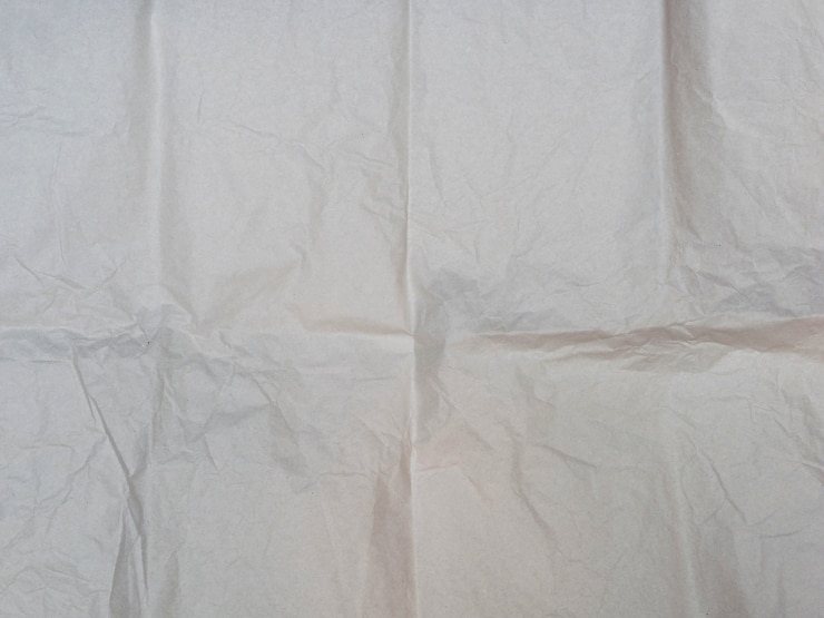 Free Photo close-up crumpled paper texture