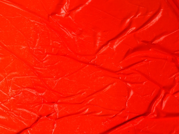 Close-up crumpled red paper background