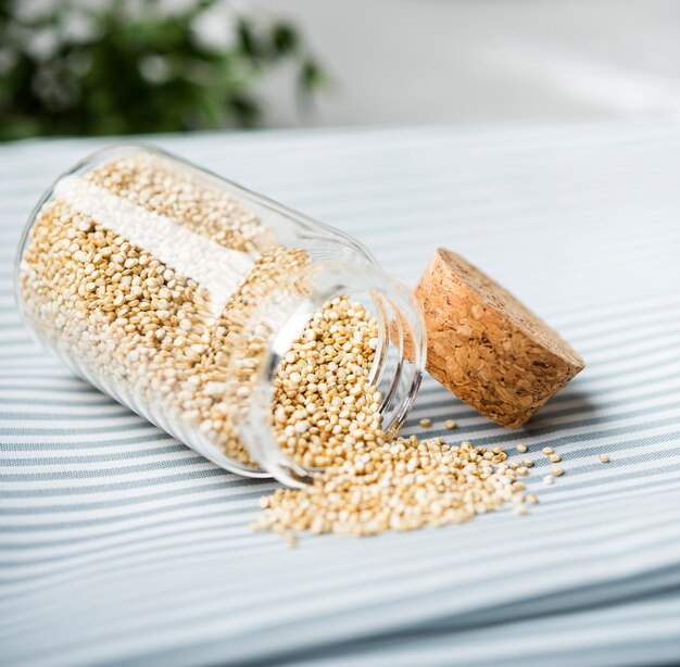 Close-up crushed seeds in jar