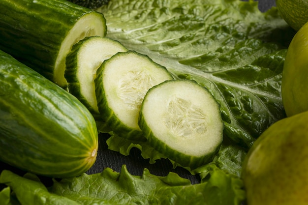 Close-up of cucumber slices with celery