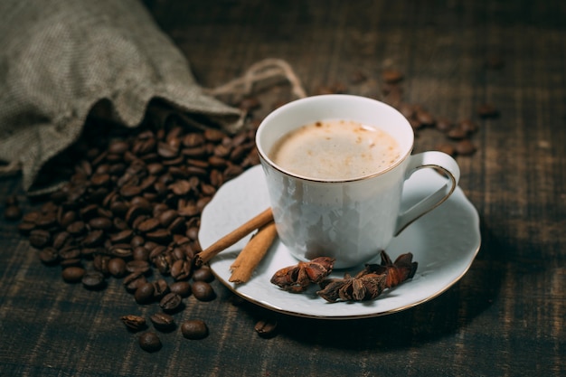 Close-up cup of coffee with star anise