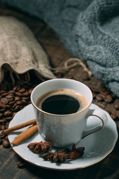 Close-up cup of coffee with star anise