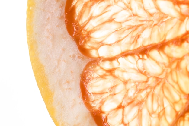 Close-up cut slice of ripe grapefruit