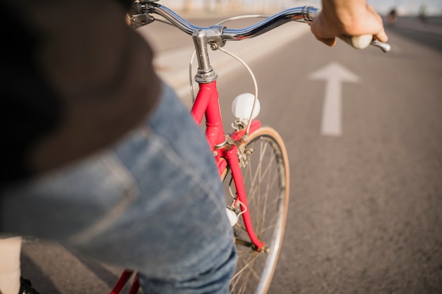 Close-up of cyclist riding bicycle