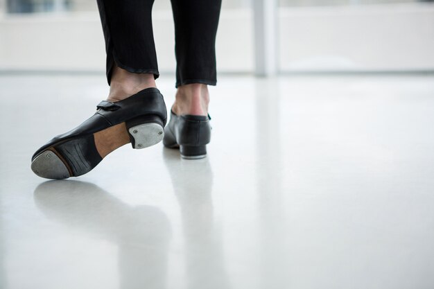 Close-up of dancer wearing tap shoes