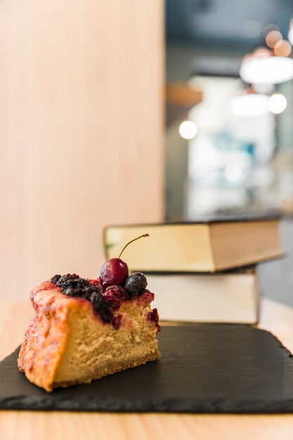 Close-up of delicious berry pastry on shale board