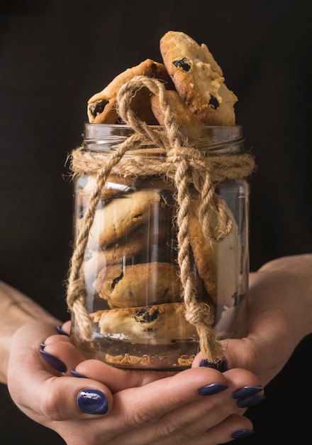 Close-up delicious chocolate cookies in a jar