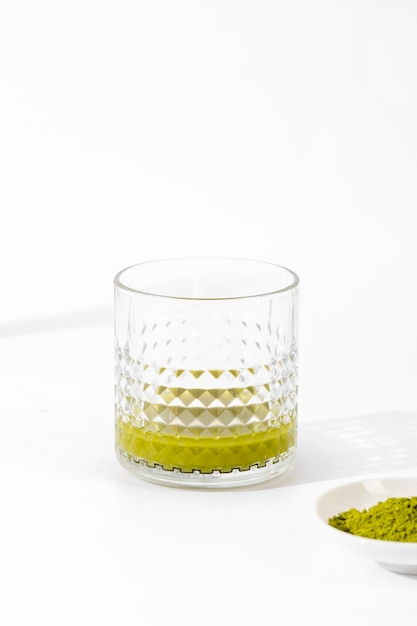 Free photo close-up delicious glass of matcha tea