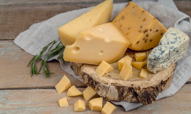 Close-up delicious traditional variety of cheese on the table