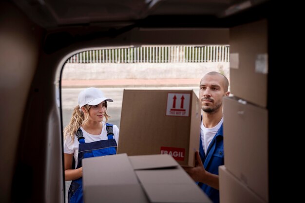 Close up delivery people working