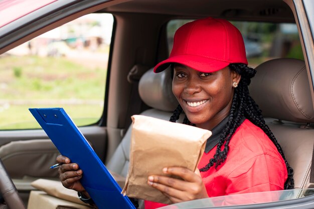 Close up on delivery person with parcel