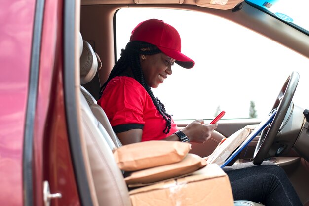 Close up on delivery person with parcels