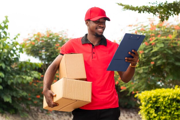 Close up on delivery person with parcels