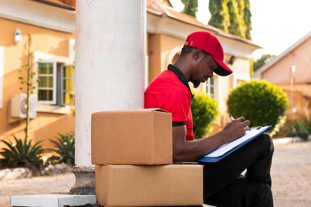 Close up on delivery person with parcels