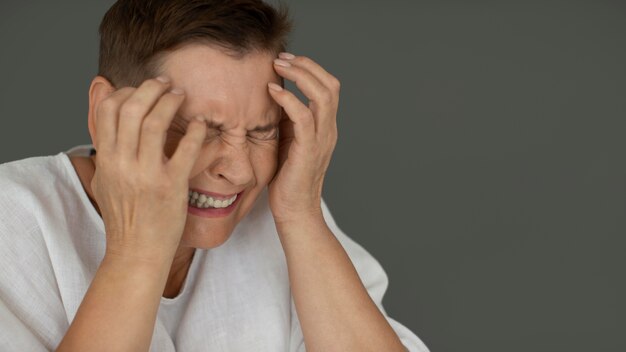 Close up depressed woman crying