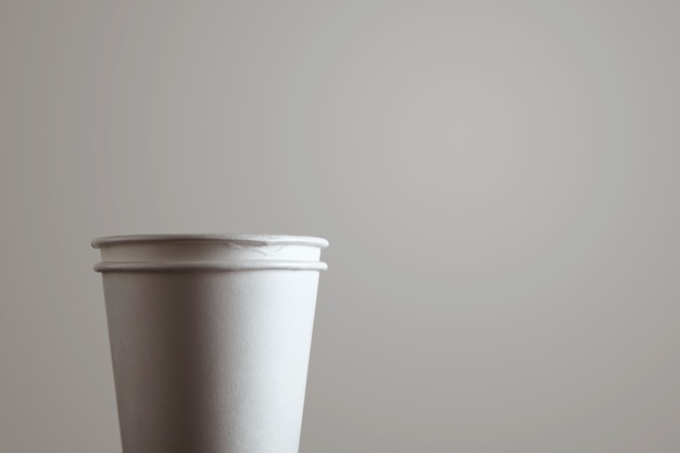 Close up detail of two blank take away paper glass isolated on white background