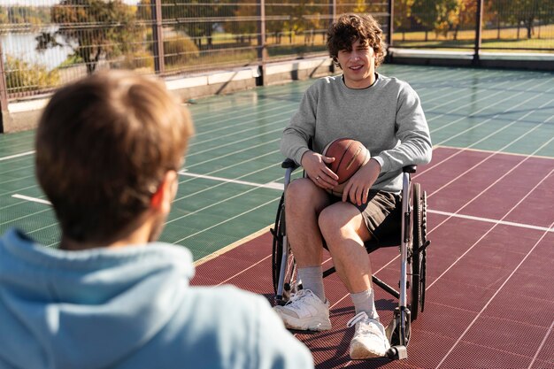 Close up disabled friends outdoors