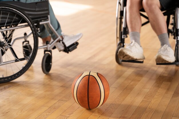 Close up disabled people and basket ball