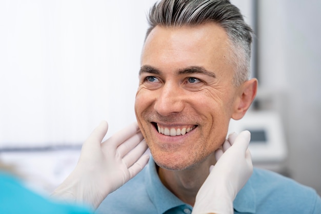 Close up doctor checking patient