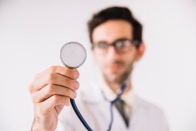 Close-up of a doctor hand showing stethoscope