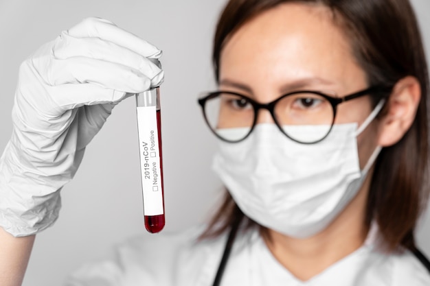 Free photo close-up doctor taking medical samples