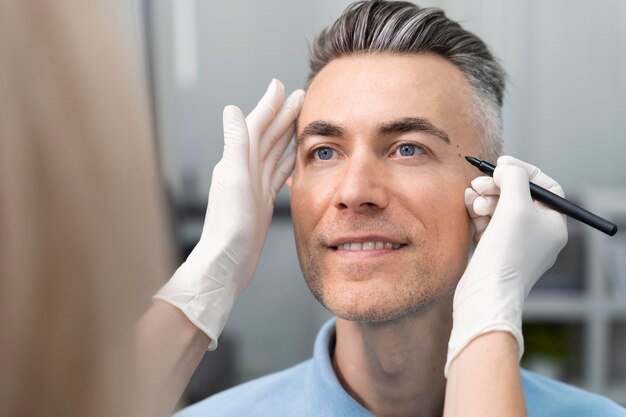 close up doctor wearing gloves