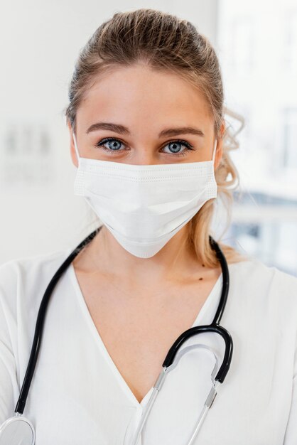 Close-up doctor wearing mask