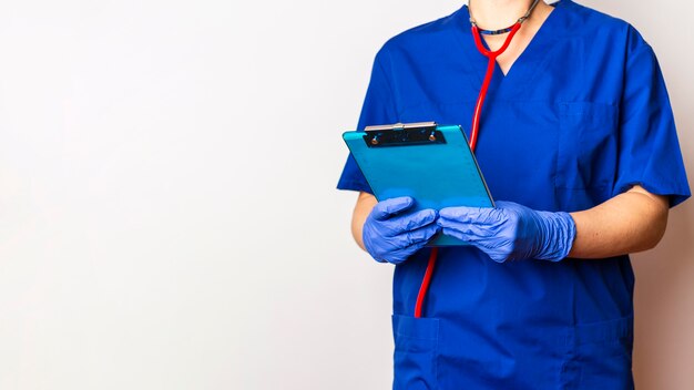 Close-up doctor wearing stethoscope