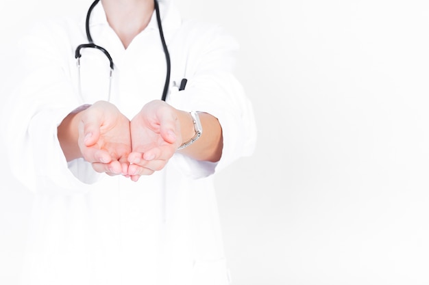 Close-up of a doctor with cupped hands